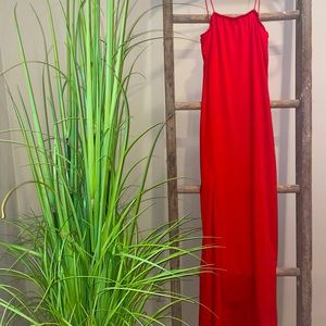Red spaghetti strap body con dress with slit. Soft material very flattering. 🌹